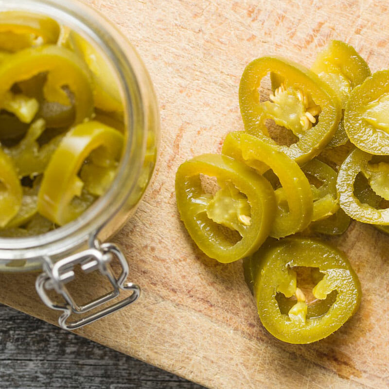 JalapeñosAdd a kick to whatever you’re snacking on with our hot and tasty Jalapeños.